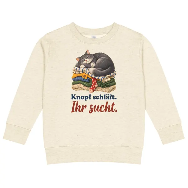 Produktfoto: Kinder-Sweatshirt „Knopf schläft. Ihr sucht.“